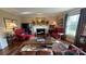 Inviting living room featuring a fireplace, plush seating, and stylish decor at 700 Valleyview Dr # 1, Albemarle, NC 28001