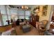 Relaxing sunroom with wicker seating, natural light, and views of the outdoors at 700 Valleyview Dr # 1, Albemarle, NC 28001