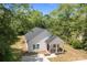 An aerial view showcases the home's architecture, landscaping, and surrounding greenery at 706 Live Oak St, Shelby, NC 28150