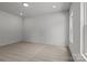 Spacious bedroom featuring plush carpeting, natural light, and a neutral palette for versatile decor at 706 Live Oak St, Shelby, NC 28150