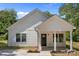 Charming home with new landscaping and a covered front porch at 706 Live Oak St, Shelby, NC 28150