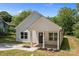 Charming home with new landscaping and a covered front porch at 706 Live Oak St, Shelby, NC 28150