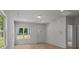 Living room with light wood floors and lots of natural light at 706 Live Oak St, Shelby, NC 28150