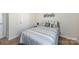 Comfortable bedroom featuring a well-made bed with stylish linens, complemented by music-themed wall decor at 7315 Amberly Hills Rd, Charlotte, NC 28215