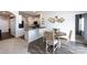 This dining area offers a small table with 4 chairs and is near kitchen area at 7315 Amberly Hills Rd, Charlotte, NC 28215