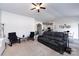Large living room with vaulted ceiling, carpet and a large comfortable sofa at 7315 Amberly Hills Rd, Charlotte, NC 28215