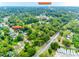 Aerial view of 8 Cauthen St with surrounding neighborhood, trees, and view of Downtown Rock Hill at 8 Cauthen St, Rock Hill, SC 29730