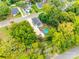 Aerial view of house showing backyard pool, patio area, detached garage, and surrounding neighborhood at 8 Cauthen St, Rock Hill, SC 29730
