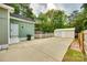 Large paved backyard and detached one car garage, fully fenced in with a view of trees at 8 Cauthen St, Rock Hill, SC 29730