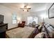 Comfortable living room with hardwood floors, area rug, and plenty of seating at 8 Cauthen St, Rock Hill, SC 29730