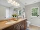 Bathroom featuring a double vanity, large mirror and updated fixtures at 8381 Chatsworth Dr, Indian Land, SC 29707