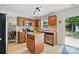 Well-appointed kitchen with modern appliances, ample cabinet space, island, and adjacent dining area at 8381 Chatsworth Dr, Indian Land, SC 29707