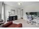 Well-appointed home office with a modern desk setup, comfortable seating, and neutral color scheme at 8381 Chatsworth Dr, Indian Land, SC 29707