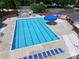 Community pool with multiple swim lanes and lounge chairs at 8744 Barrister Way, Charlotte, NC 28216