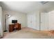 Bedroom with a large window offering plenty of natural light and a quaint desk at 8744 Barrister Way, Charlotte, NC 28216