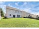 Expansive backyard featuring a well-manicured lawn, and privacy fence at 8916 Inverness Bay Rd, Charlotte, NC 28278