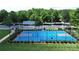 View of the outdoor basketball court for residents with black fencing at 8916 Inverness Bay Rd, Charlotte, NC 28278