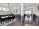 View of the dining room leading to the living space, providing an open concept layout at 8916 Inverness Bay Rd, Charlotte, NC 28278