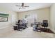 Spacious home office with two desks, comfortable chairs, and bright natural lighting at 9034 Kensington Forest Dr, Harrisburg, NC 28075