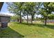 Expansive backyard featuring mature trees and green grass, offering ample space for recreation at 1067 Winchester Dr, Rock Hill, SC 29730