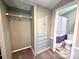 Organized closet with shelving and rod, adjacent to a bathroom, providing ample storage and convenience at 108 Sailors Ct # 108 B, Mount Gilead, NC 27306
