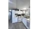 Bright kitchen showcasing ample storage, white cabinets, modern appliances, and a functional layout at 108 Sailors Ct # 108 B, Mount Gilead, NC 27306