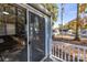View from the porch of house 108, features ample lighting and a sliding glass door at 108 Sailors Ct # 108 B, Mount Gilead, NC 27306