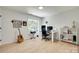 Bedroom featuring wood floors, a desk, and natural light at 1134 Blueberry Ln, Charlotte, NC 28226