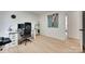 Bedroom featuring wood floors, a desk, and natural light at 1134 Blueberry Ln, Charlotte, NC 28226