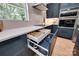 This well-organized kitchen features matching hardware and a view from a window to the yard at 1134 Blueberry Ln, Charlotte, NC 28226