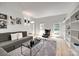 Bright living room featuring modern furniture, large windows, and stylish decor creating a comfortable atmosphere at 1134 Blueberry Ln, Charlotte, NC 28226