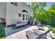 Spacious outdoor patio features dining and lounge areas, great for entertaining at 1134 Blueberry Ln, Charlotte, NC 28226