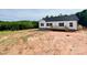 New construction home surrounded by trees and nature at 118 Brett Will Ct, Taylorsville, NC 28681