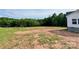 A vacant lot surrounded by lush trees at 118 Brett Will Ct, Taylorsville, NC 28681