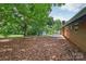 Spacious backyard with brick exterior, mature trees, and a perfect spot for outdoor entertaining at 1192 Carolyn Dr # 9, Albemarle, NC 28001