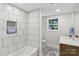 Modern bathroom with tiled shower and niche, updated vanity, and a neutral color palette at 1192 Carolyn Dr # 9, Albemarle, NC 28001