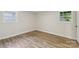 This cozy bedroom is illuminated by two large windows, and is fitted with hardwood flooring at 1192 Carolyn Dr # 9, Albemarle, NC 28001
