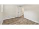 Bedroom featuring hardwood flooring and a closet with white doors at 1192 Carolyn Dr # 9, Albemarle, NC 28001