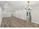 Expansive living room with wood floors and neutral walls offers versatile living space at 1192 Carolyn Dr # 9, Albemarle, NC 28001