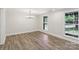 Open-concept living area features hardwood floors, recessed lighting, and large windows at 1192 Carolyn Dr # 9, Albemarle, NC 28001