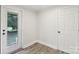 A bright room with access to the outdoors and an interior door at 1192 Carolyn Dr # 9, Albemarle, NC 28001