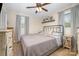 Cozy bedroom with natural light, a ceiling fan, and neutral decor at 127 Leonidas St, Fort Mill, SC 29715
