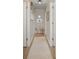 Bright hallway with neutral paint, wood floors, and access to multiple rooms at 127 Leonidas St, Fort Mill, SC 29715