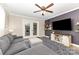 Comfortable living room with a dark accent wall, stylish shelving, and a door to the outdoors at 127 Leonidas St, Fort Mill, SC 29715