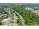 An aerial shot of a neighborhood with tree-lined streets and manicured lawns at 1321 Land Grant Rd, Charlotte, NC 28217