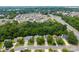 Aerial shot of a community with lush trees and well-maintained homes at 1321 Land Grant Rd, Charlotte, NC 28217