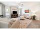 Inviting living room featuring comfortable seating, stylish decor, and ample natural light creating a cozy atmosphere at 1456 Augustus Beamon Dr, Indian Trail, NC 28079