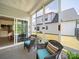 Inviting screened-in porch with comfortable seating, perfect for relaxing and enjoying the outdoors at 1456 Augustus Beamon Dr, Indian Trail, NC 28079