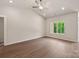 Bedroom with a vaulted ceiling, light walls and wooden flooring at 1503 Doran Ter, Richburg, SC 29729