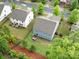 Aerial view of the home, showcasing its spacious backyard and well-maintained landscaping at 15630 Oleander Dr, Charlotte, NC 28278